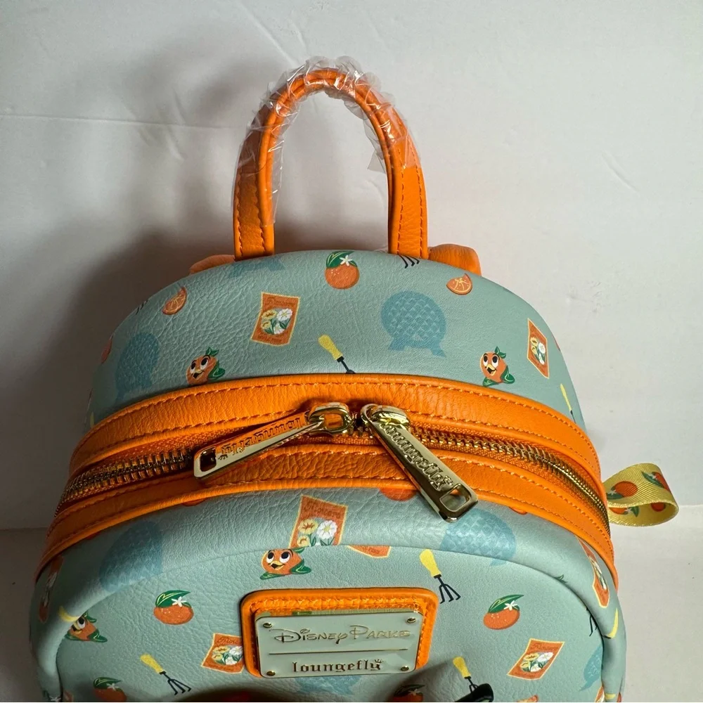 NWT. Disney Loungefly featuring Orange Bird. Approx. 10" H x 9 1/2" W x 5" D - Picture 2 of 14